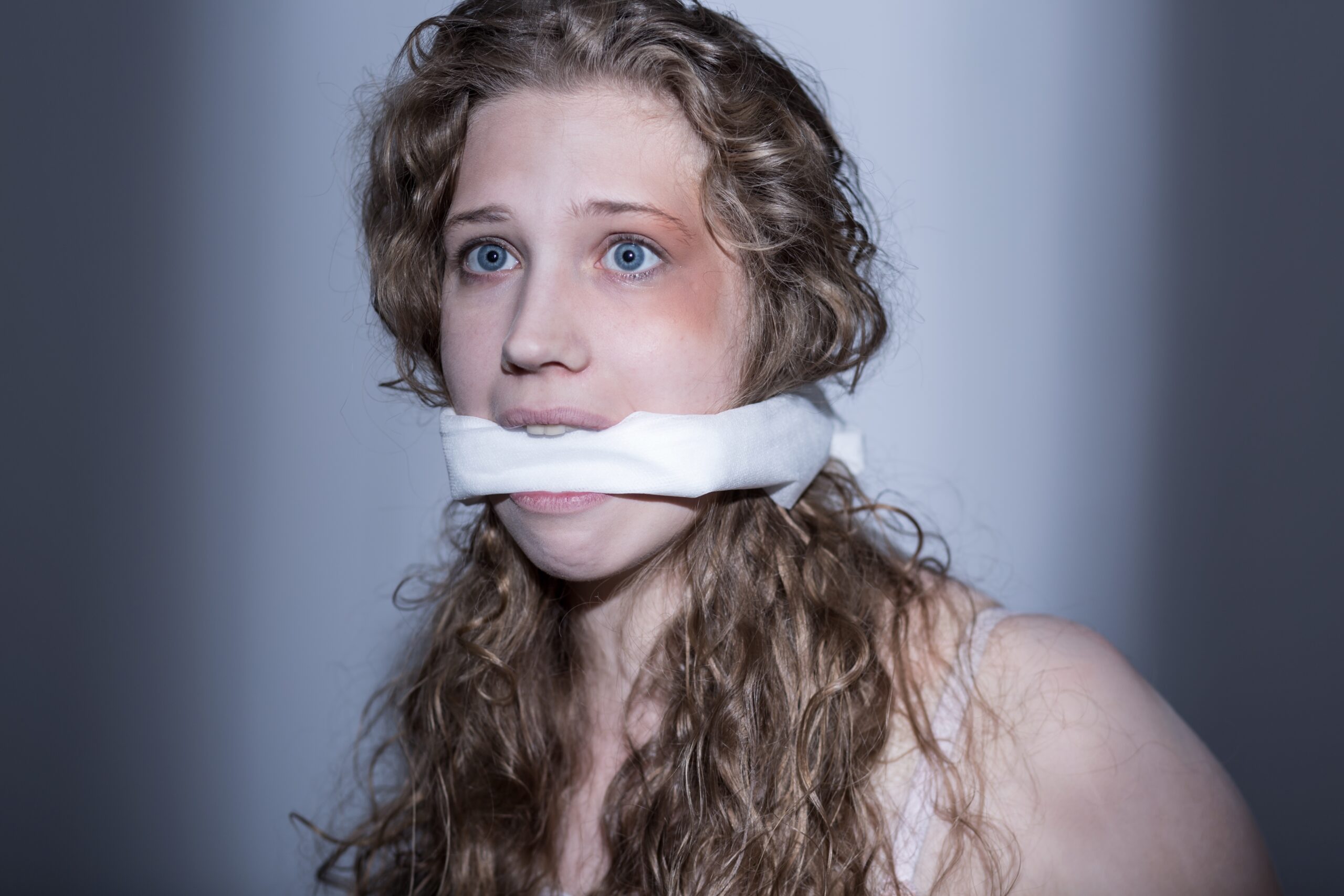 frightened-woman-with-a-black-eye-has-gagged-mouth-2025-10-03-20-43-01-utc