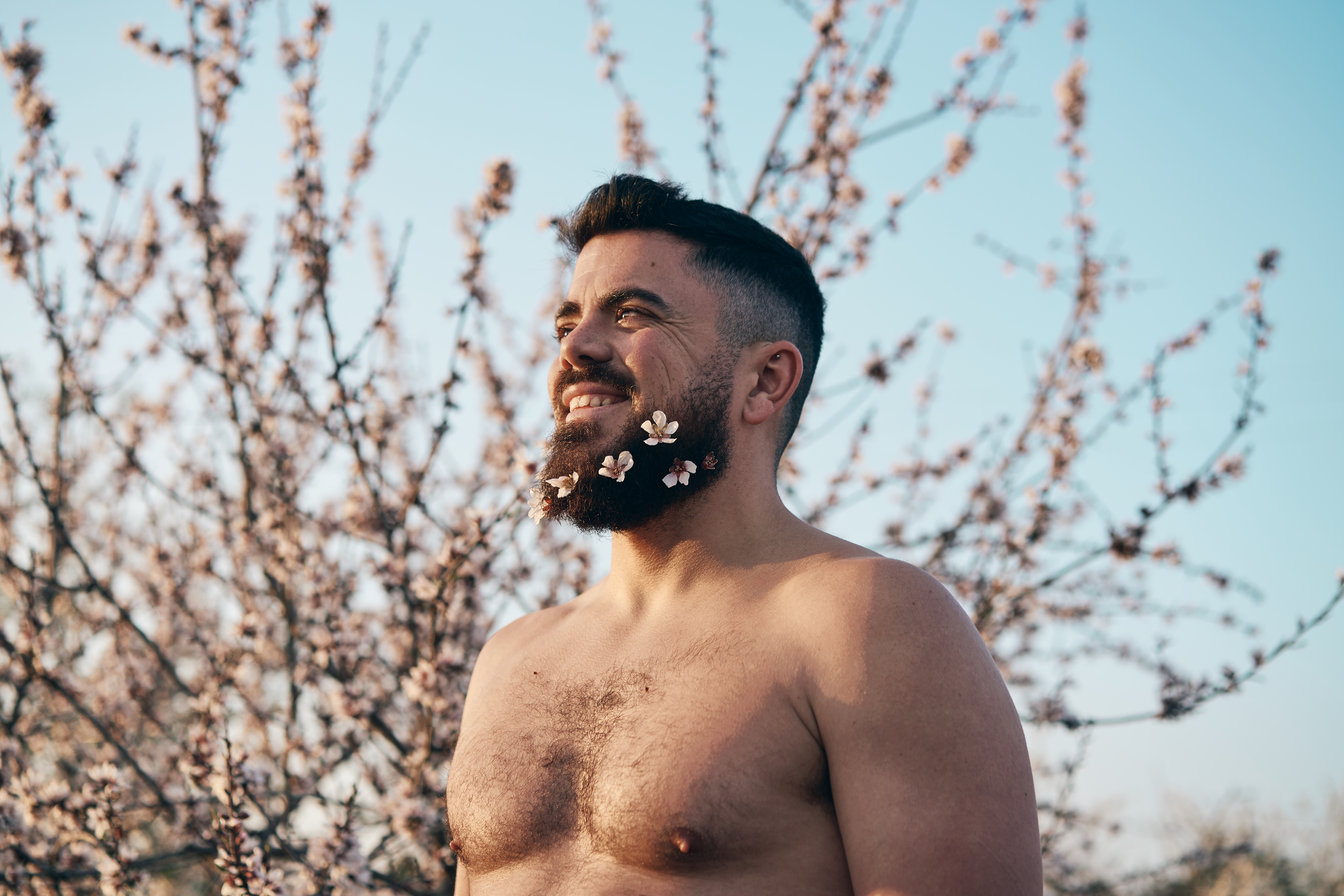 Man with flowers in beard