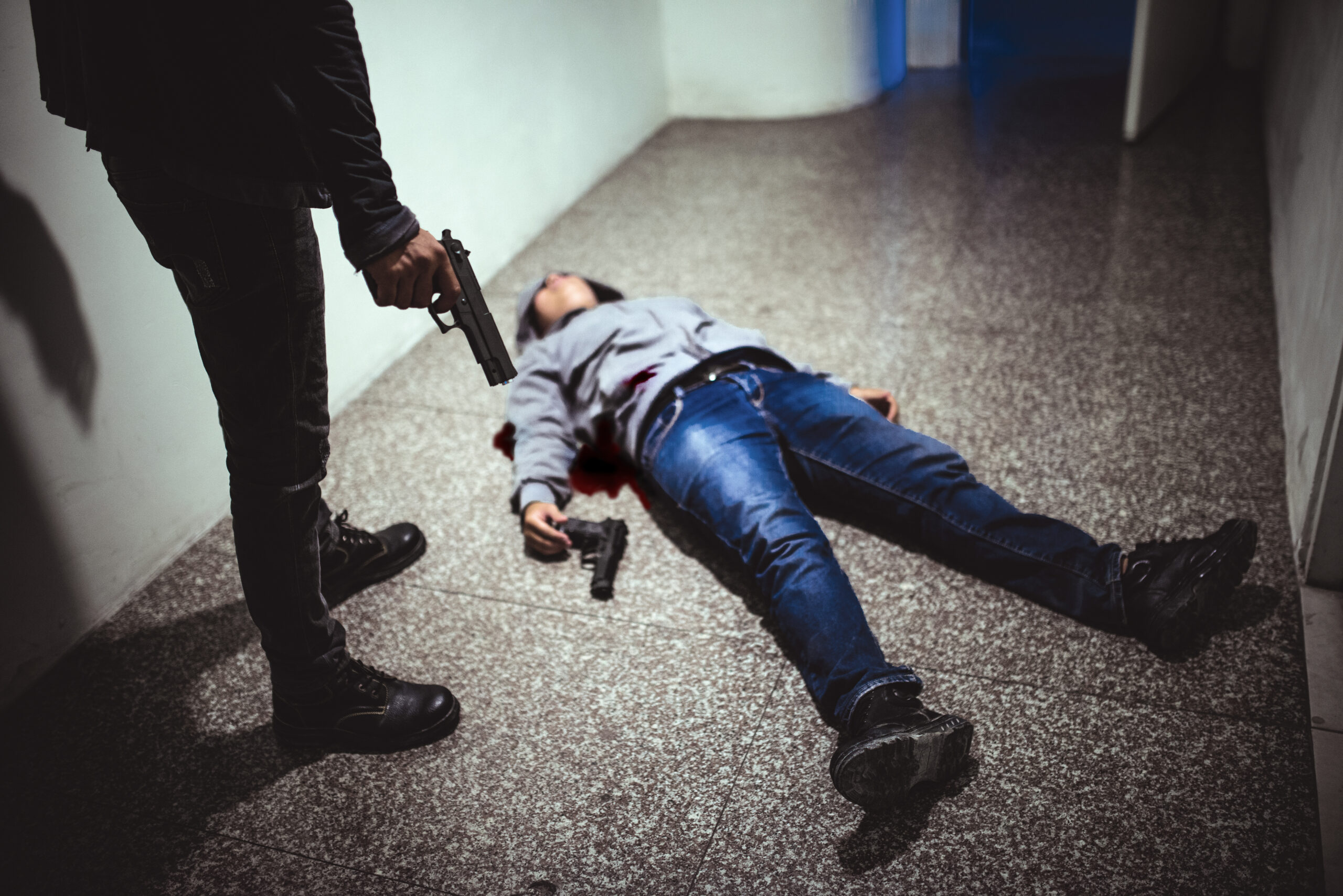 Hitman with dead victim