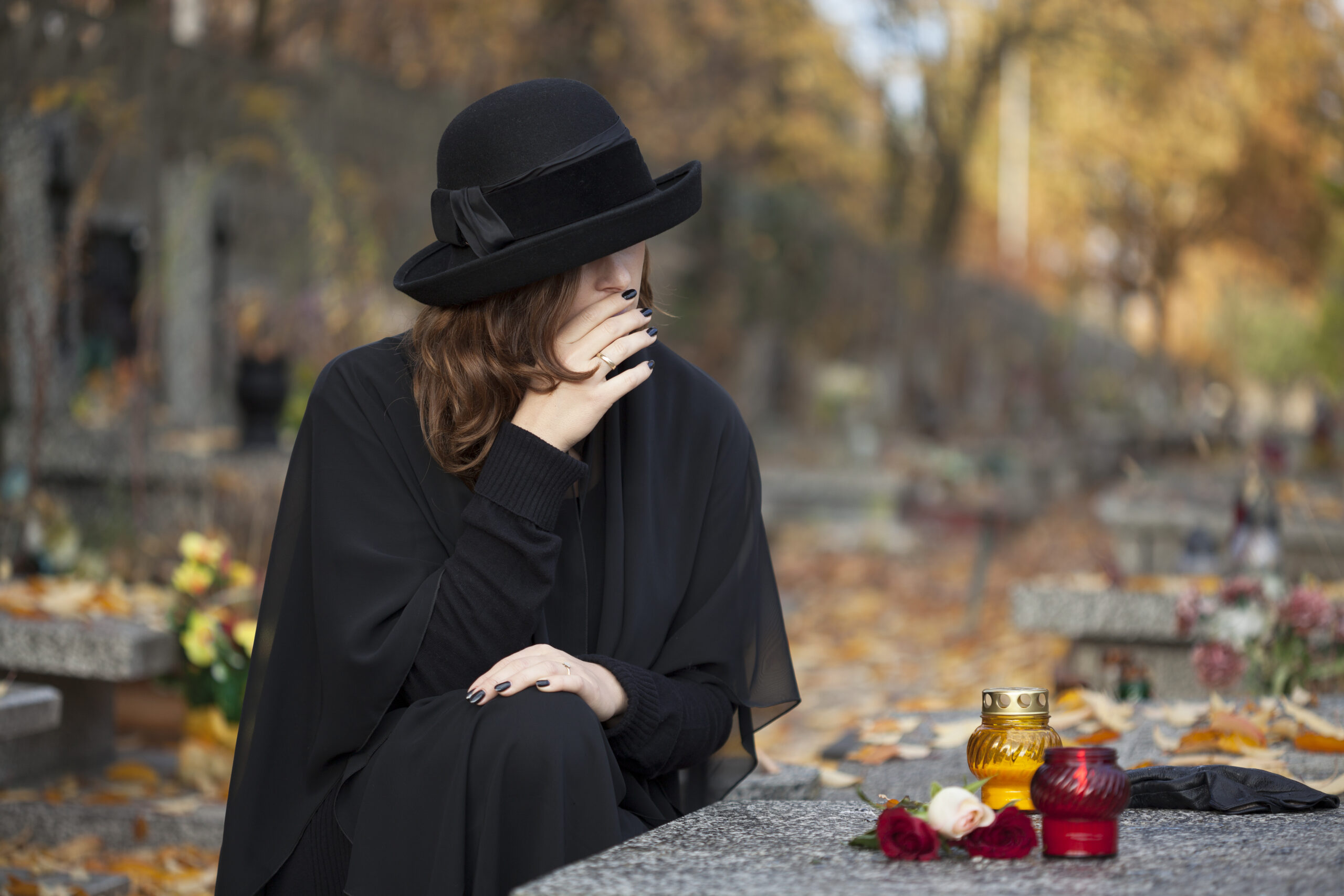 woman-in-deep-sorrow-dressed-in-black-at-graveyard-2025-10-01-16-47-27-utc
